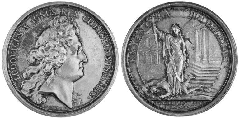 Here’s a coin that King Louis XIV had struck, which says ‘Extinguish Heresies,’ marking his revocation of the Edict of Nantes